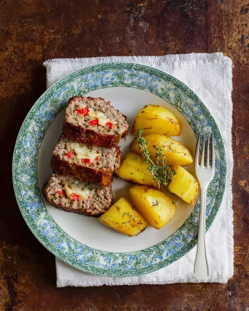 Cheese Stuffed Meatloaf with Feta, Gruyere, and Roasted Red Peppers Recipe