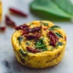 Baked Eggs with Sun-Dried Tomato and Spinach Recipe