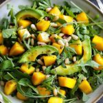 Avocado Mango Salad with Arugula, Pine Nuts & Honey-Lime Dressing