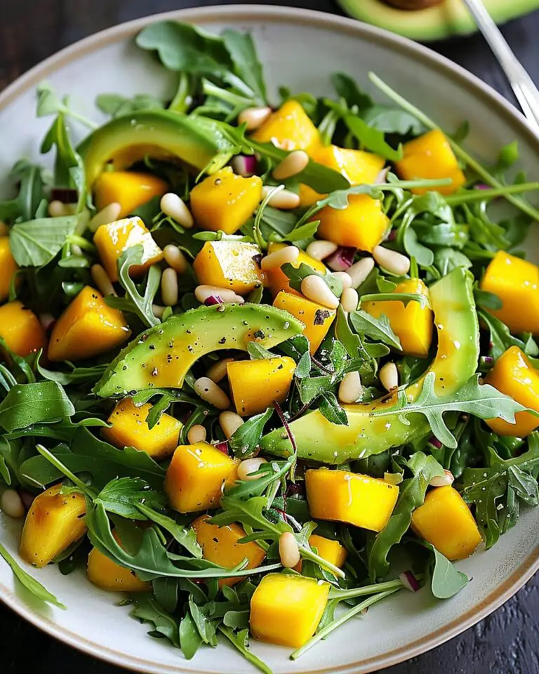Avocado Mango Salad with Arugula, Pine Nuts & Honey-Lime Dressing