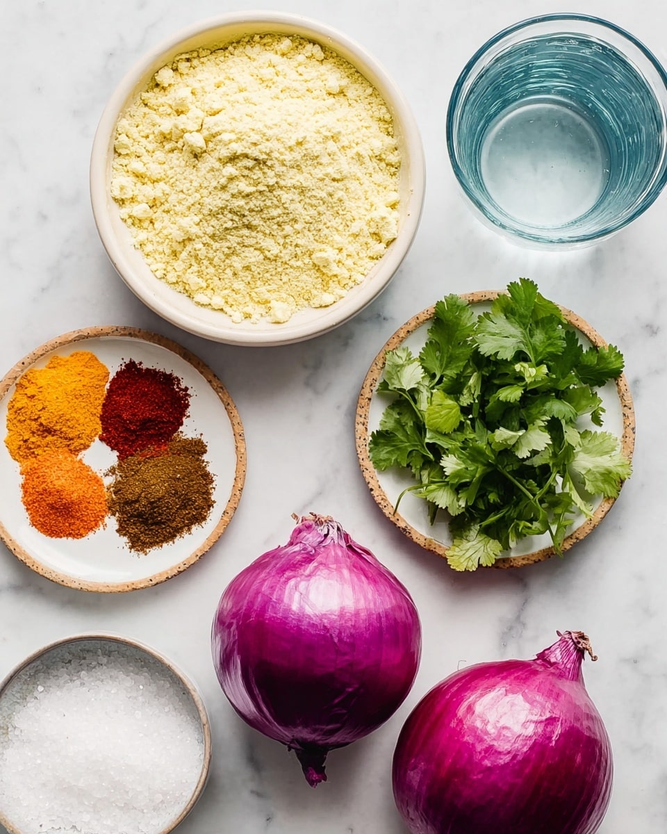 The image shows a top view of several small white bowls placed on a white marbled surface. One bowl is filled with a light yellow, crumbly flour mixture, another holds green leafy cilantro, and a third displays three piles of ground spices in dark brown, bright orange, and red colors. Two whole red onions with bright purple-red skin are placed next to the bowls. There is also a transparent glass filled with water and a small bowl filled with coarse white salt in front. photo taken with an iphone --ar 4:5 --v 7