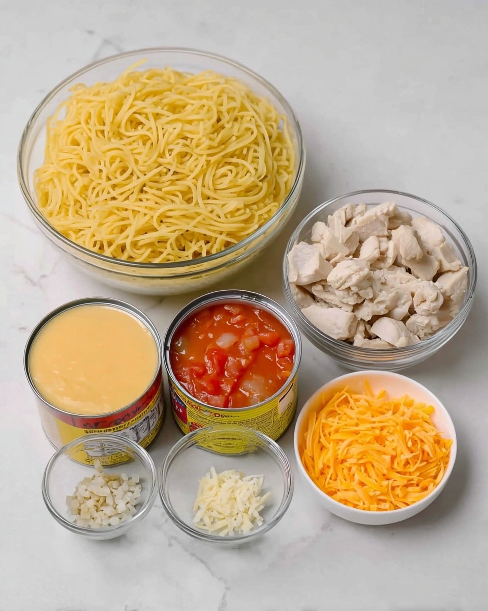 The image shows several ingredients arranged on a white marbled surface. There is a large clear glass bowl filled with yellow cooked noodles placed at the back left. Next to it on the right is a smaller clear glass bowl with light-colored cooked chicken pieces. In front of the noodle bowl, there are three opened cans: one with yellow cheese sauce, another with cream of mushroom soup, and the last with diced tomatoes in red sauce. To the right of the cans is a small white bowl filled with shredded orange cheese. In front of everything, a small clear glass bowl holds finely minced garlic. The background is plain light grey. photo taken with an iphone --ar 4:5 --v 7