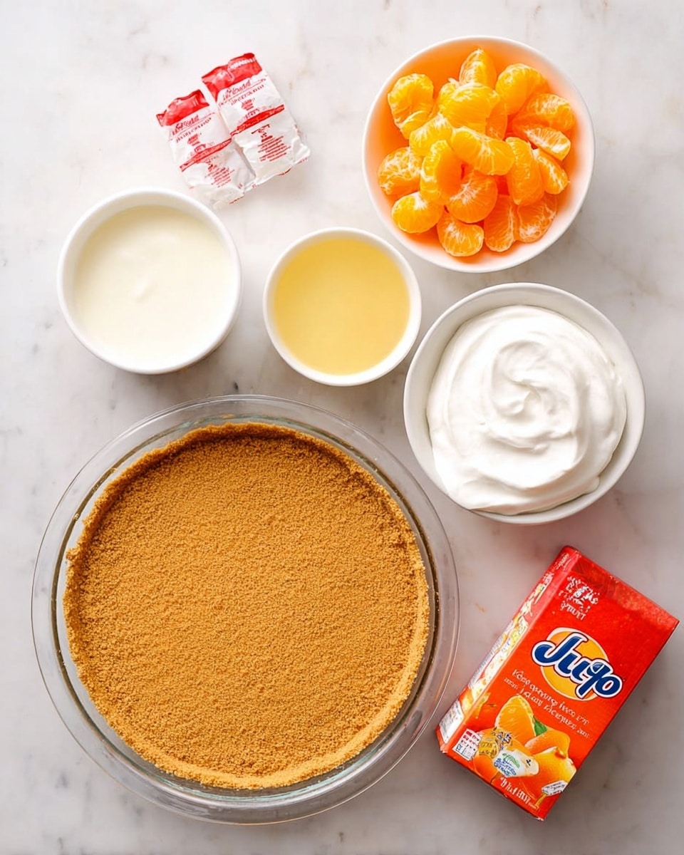 A top view of recipe ingredients arranged on a white marbled surface, including a round glass dish with a single thick layer of light brown crumb crust filling the bottom, a white bowl of smooth, thick white whipped topping, a small white bowl filled with bright orange mandarin slices, a glass bowl with a pale yellow liquid, two red and white yogurt containers placed side by side, and a bright orange boxed Jello packet. The items are spread out evenly and clearly separated from each other. Photo taken with an iphone --ar 4:5 --v 7