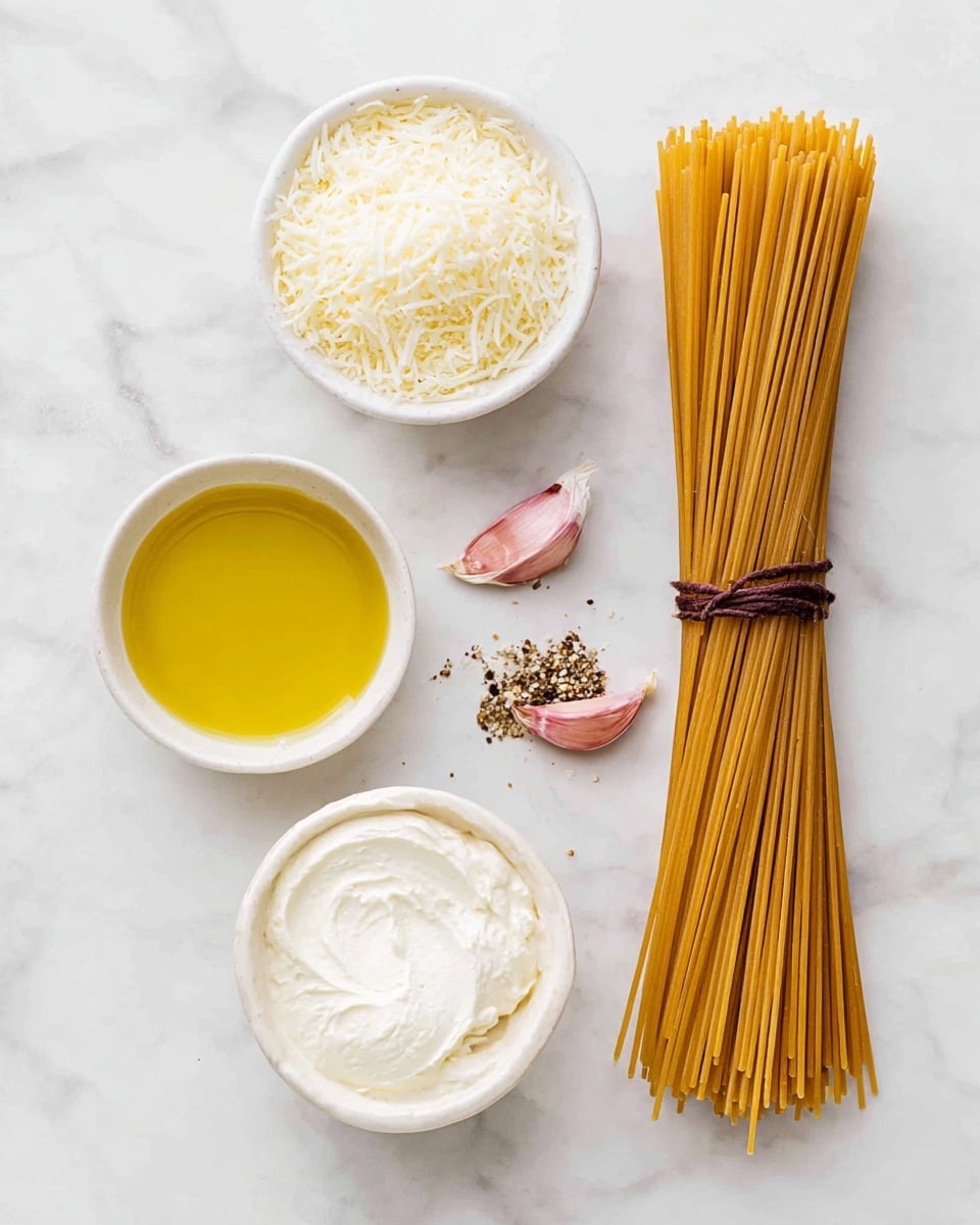 A bundle of uncooked golden-brown spaghetti tied with a dark brown string lies vertically on the right side on a white marbled surface. To the left, there are four small white round bowls arranged in a loose grid: the top right bowl contains two cloves of pinkish garlic with salt and black pepper, the top left bowl holds light off-white finely shredded cheese, the bottom left bowl is filled with golden-yellow olive oil, and the bottom right bowl shows a smooth, creamy white spread with soft texture. The scene is bright and clean with soft natural light. Photo taken with an iphone --ar 4:5 --v 7