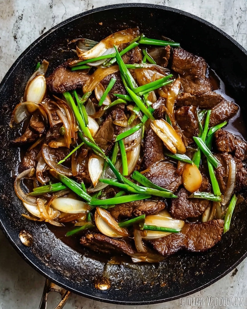 The image shows a black frying pan on a white marbled surface filled with cooked beef slices in dark brown sauce. The beef pieces are medium-sized and scattered throughout the pan. Mixed with the beef are thin slices of light yellow onions and whole pieces of green onions laid across the beef for color contrast. The sauce has a glossy texture that coats the ingredients, making them look juicy and tender. Photo taken with an iphone --ar 4:5 --v 7