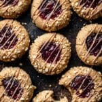 Peanut Butter Jam Thumbprint Cookies with White Chocolate Drizzle Recipe
