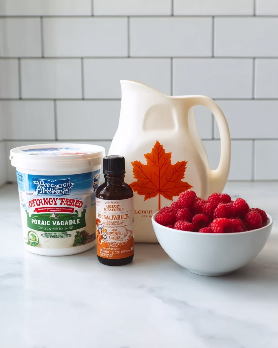 The image shows four items placed side by side on a white marbled surface in front of a white tiled background. On the left is a white container of Stonyfield Organic Greek yogurt with a green and blue label and red text. Next to it, in the center-left, is a large white jug of pure maple syrup with an autumn leaf on the label. To the right of that is a small dark bottle labeled organic alcohol-free pure vanilla flavor. On the far right, there is a white bowl filled with fresh red raspberries. The lighting is soft and natural, making the colors clear and vibrant. photo taken with an iphone --ar 4:5 --v 7