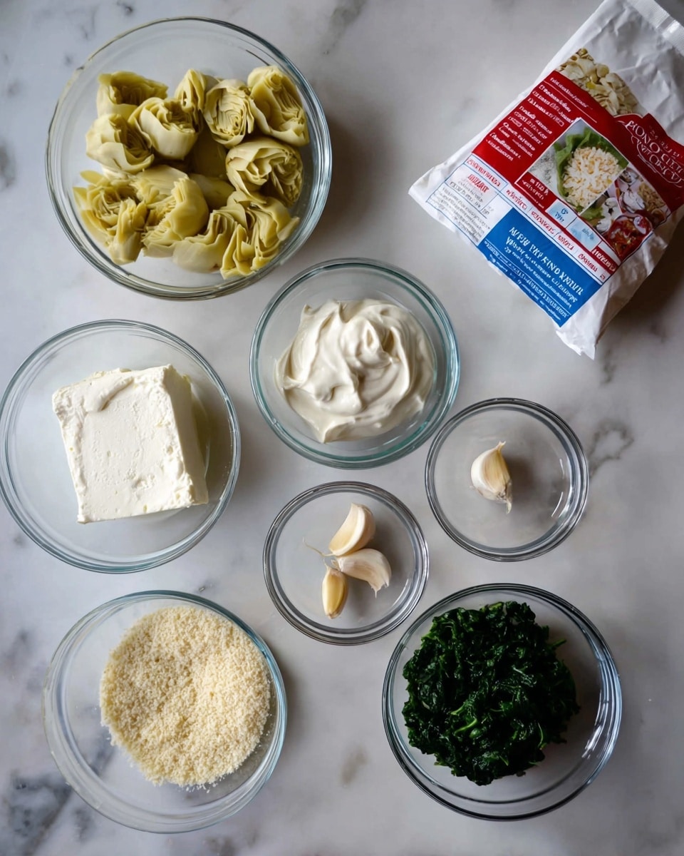 The image shows several clear glass bowls arranged on a white marbled surface, each containing different ingredients. At the top left, there is a bowl filled with pale yellow artichoke hearts, next to it on the right is a bowl of thick white sour cream. Below the sour cream is another small bowl with a white block of cream cheese. To the right of these bowls is a bright white packet of wonton wrappers with red and blue text. At the bottom left, there is a bowl filled with light beige breadcrumbs. Next to it, on the bottom right, is a bowl filled with finely chopped dark green spinach. Near the center bottom, two peeled garlic cloves rest inside a tiny clear bowl. A woman's hand could be holding or near these ingredients but is not shown here. photo taken with an iphone --ar 4:5 --v 7