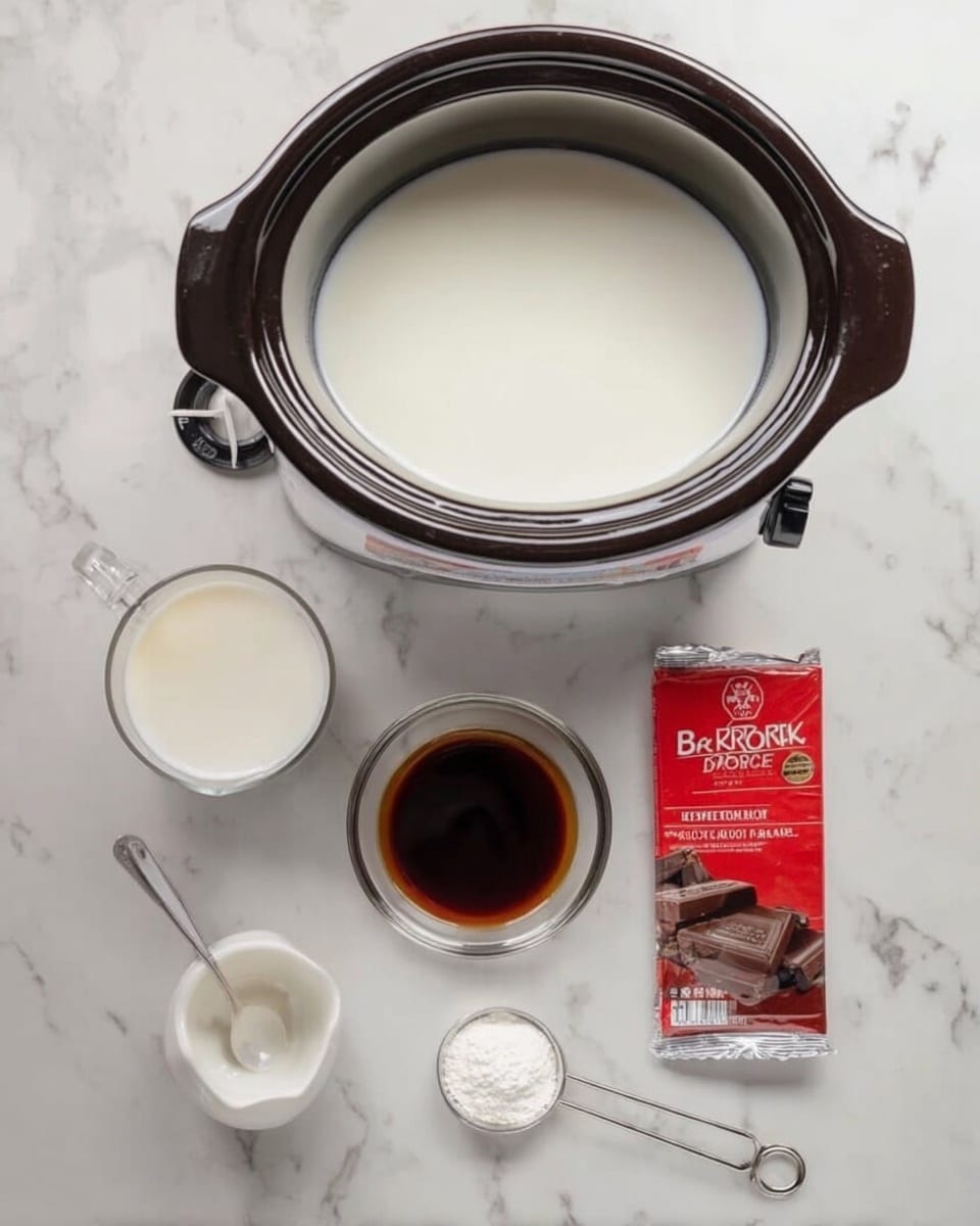 The image shows a slow cooker filled with white liquid placed on a white marbled surface. In front of the cooker, there is a glass cup with white liquid on the left, a small glass bowl with dark brown liquid in the middle, and a small white spoon with white powder to the right of it. Next to these, there is a red and brown chocolate bar package lying flat. To the right of the package, a small metal measuring spoon and a white container with a white lid are visible. All items are neatly arranged and viewed from above. photo taken with an iphone --ar 4:5 --v 7
