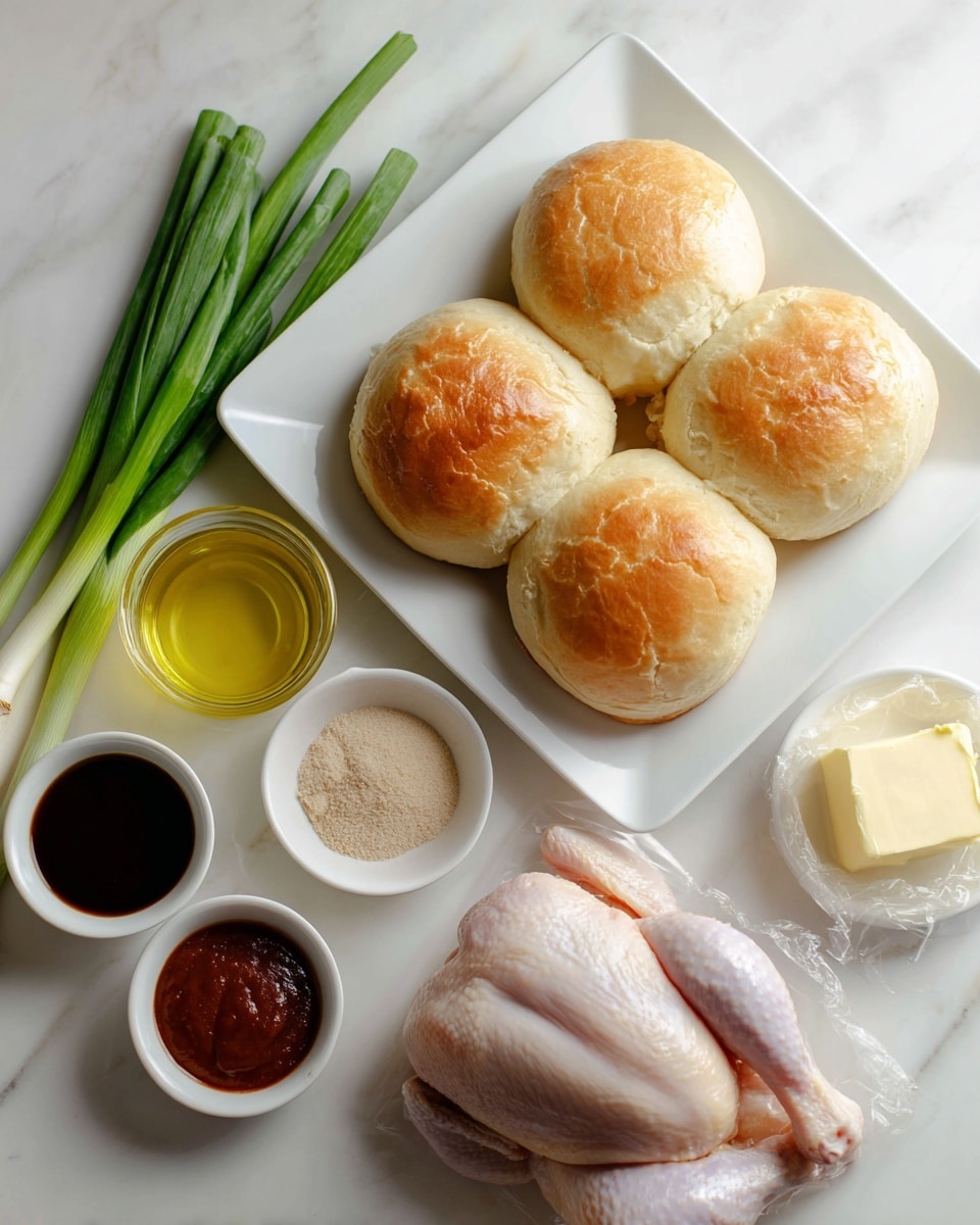 A white square plate holding six soft dinner rolls that are golden brown on top, with some small cracks visible on the surface. To the left of the plate, there is a bunch of fresh green onions with white bulbs and green stalks lying on a white marbled surface. Below the plate, there is a raw whole chicken placed flat, with smooth pale pink skin. Surrounding the chicken are small bowls and containers holding different ingredients: a small brown bowl with light beige powder, a small white bowl with finely minced garlic, a dark container with thick reddish-brown sauce, a clear jar of yellowish oil, a small white bowl with dark soy sauce, and a small wrapped rectangle of butter. The scene is clean and bright, with all items arranged neatly on the white marbled texture. Photo taken with an iphone --ar 4:5 --v 7