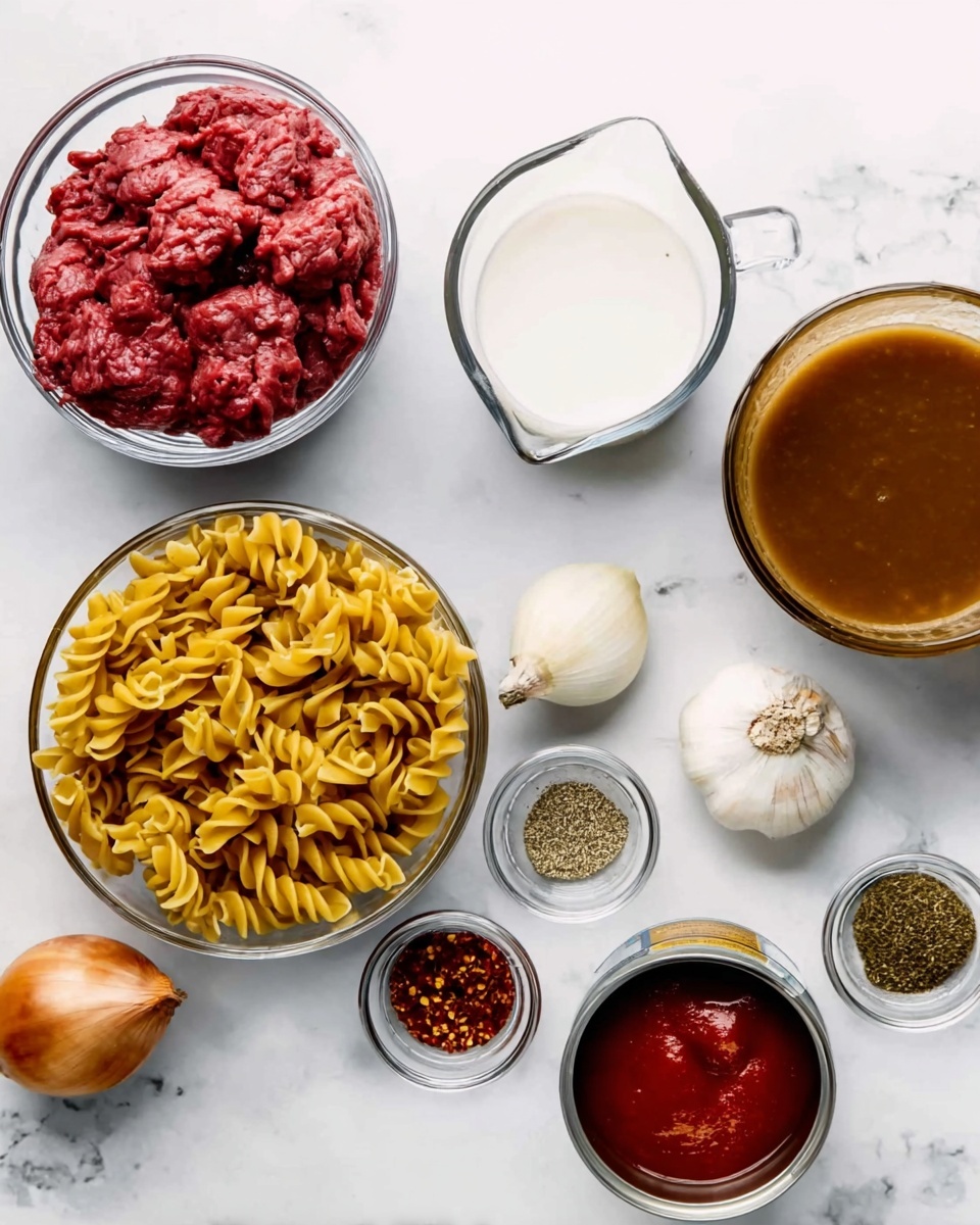 The image shows a white marbled surface with various cooking ingredients arranged neatly. There is a clear glass bowl filled with red raw ground meat in the top left corner. Below it, there is a white bowl filled with uncooked spiral pasta in golden yellow color. To the right of these, two clear glass measuring cups contain light cream and light brown broth. Positioned further right are a whole brown onion and two garlic cloves. Above the onion, small white bowls hold crushed red chili flakes and dried mixed herbs. In the bottom right corner, an opened white can with red tomato sauce is next to a small white bowl filled with the same red tomato sauce. photo taken with an iphone --ar 4:5 --v 7