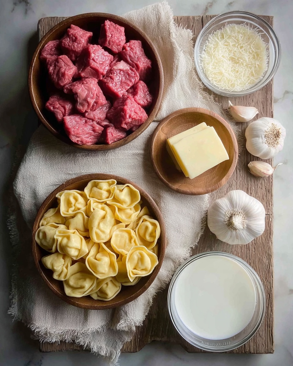 The image shows a flat wooden surface covered partially by a light beige cloth with rough edges. On it, there are six items: a round bowl with red raw meat chunks that have a coarse texture; another round bowl filled with yellow tortellini pasta that looks smooth and plump; a smaller round bowl holding a pale yellow block of butter with straight edges; a small clear glass container with white grated cheese inside; a small round bowl of white milk with a smooth surface; and three whole garlic bulbs along with three separate peeled garlic cloves with their rough, papery textures, scattered near the bowls. Everything is arranged neatly and spaced out on a white marbled textured background. photo taken with an iphone --ar 4:5 --v 7