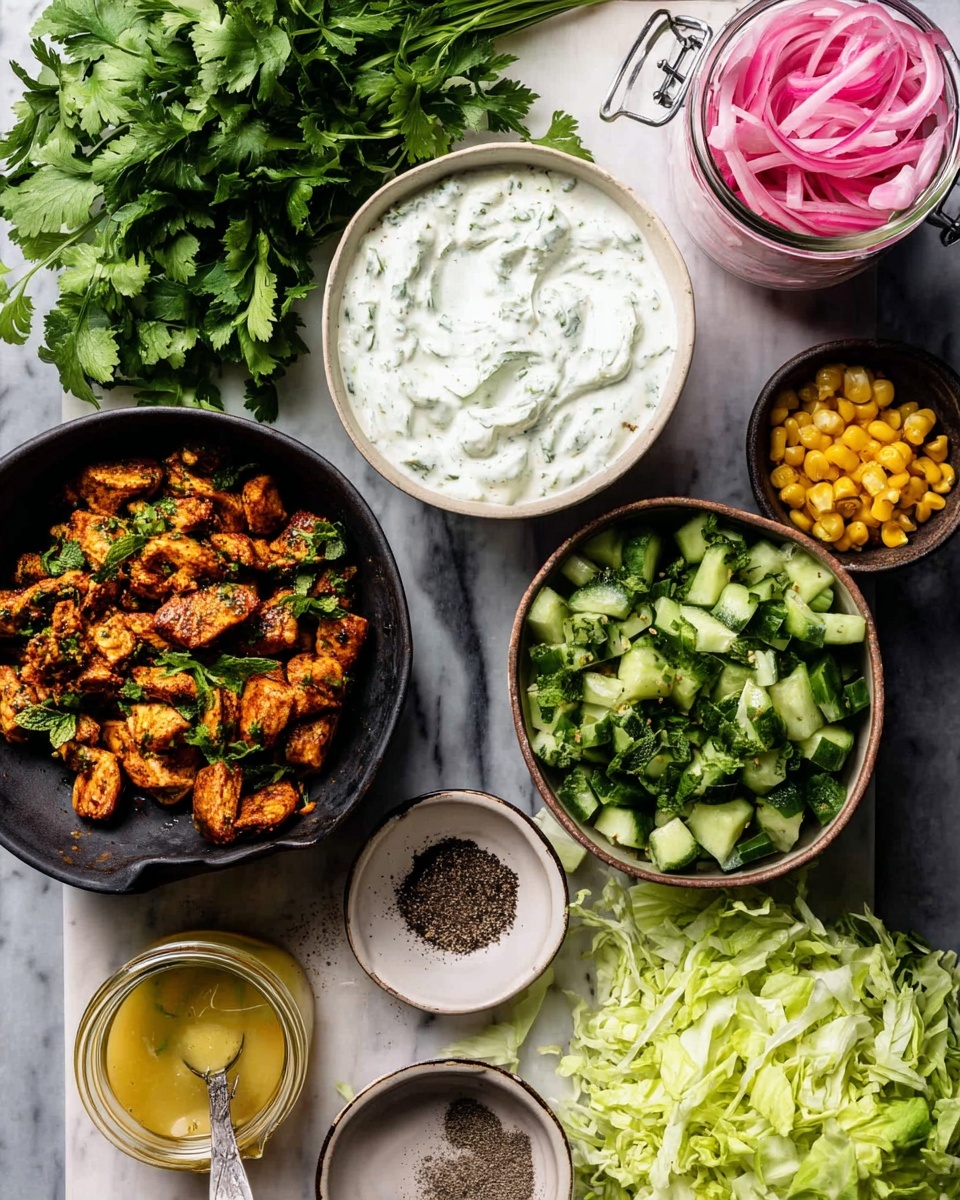 The image shows a top view of several bowls and ingredients arranged on a white marbled surface. At the center is a medium white bowl filled with a white yogurt-based sauce mixed with herbs, its texture creamy and smooth with green flecks. Below it is a large black bowl filled with small pieces of grilled, brownish-orange seasoned meat with a slightly crispy texture. To the right, another large black bowl holds diced green cucumbers mixed with herbs, topped with fresh green leaves. In between the bowls is shredded green lettuce spread out, adding a fresh contrast. Near the top left is a bunch of fresh green parsley. Below it is a small transparent glass container with a thick yellowish sauce and a spoon inside. To the right of the parsley is a small white bowl filled with black pepper. At the top right, there is a clear glass jar containing pink pickled onions with yellow corn kernels inside. The overall layout is neat and colorful, emphasizing fresh ingredients. photo taken with an iphone --ar 4:5 --v 7