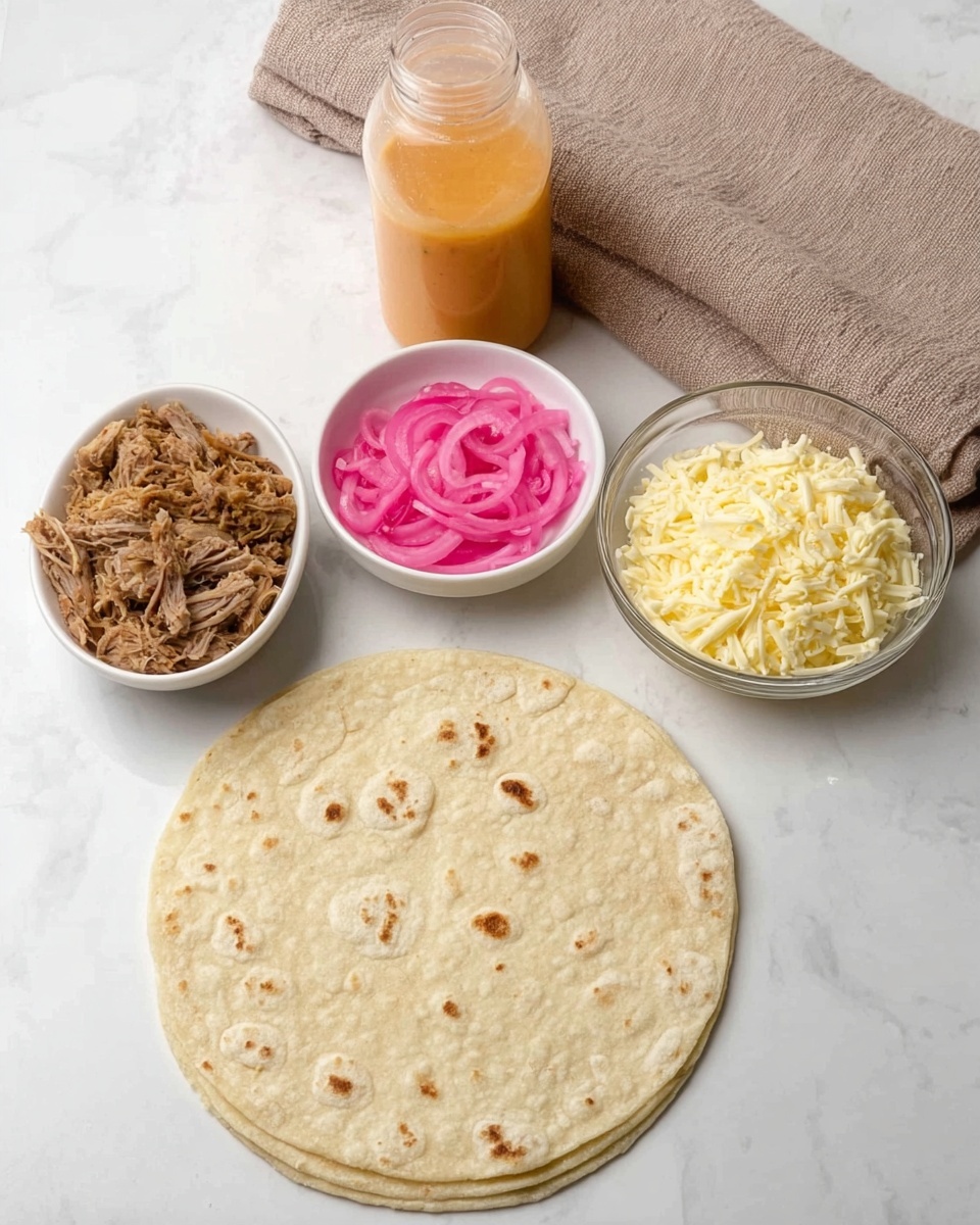 The image shows four main food elements on a white marbled surface: a single round tortilla spread flat, light beige with small brown spots; a small white bowl filled with bright pink pickled onions with thin, soft texture; a clear glass bowl holding shredded pale yellow cheese with a soft and fluffy look; and another clear glass bowl containing cooked shredded brown meat with visible texture. There is also a clear squeeze bottle with light orange sauce inside, positioned behind the bowls, and a beige cloth in the background. The photo taken with an iphone --ar 4:5 --v 7