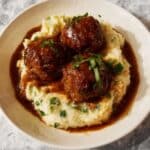 Braised Meatballs in Red Wine Gravy with Garlic Mashed Potatoes and Sautéed Spinach Recipe