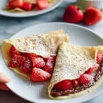 Easy Sweet Crepes with Fresh Strawberries, Nutella, and Powdered Sugar Recipe