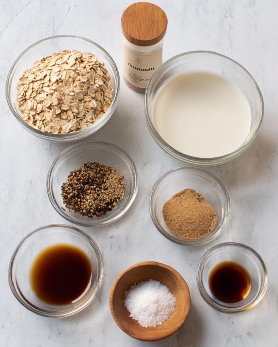 The image shows six clear glass bowls each holding different ingredients on a white marbled surface. Starting from the top left, one bowl is filled with light brown rolled oats. Next to it is a tall clear container with a wooden lid labeled cinnamon. To the right is a larger bowl filled with a white liquid that looks like milk. Below these, there is a bowl with light brown sugar and another bowl with a small amount of dark brown liquid, likely vanilla extract. At the bottom left, a bowl contains a mix of dark spices and seeds. In front, a small wooden bowl holds a fine white powder, probably salt. The bowls are neatly arranged close together. photo taken with an iphone --ar 4:5 --v 7
