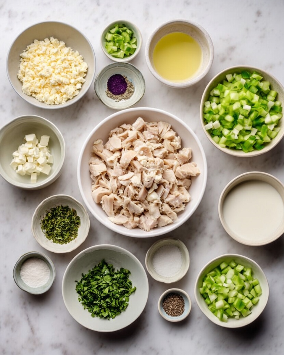 The image shows eleven small white bowls arranged neatly on a white marbled surface, each filled with different chopped or prepared ingredients. At the center is a larger bowl filled with chopped light beige chicken. Surrounding it, starting from the top left and going clockwise, there is a bowl with crumbled pale yellow cheese, a bowl with light yellow broth, a bowl of thick white yogurt, a bowl of white salt, a bowl with finely chopped dark green herbs, a small bowl with minced light yellow garlic, a bowl of ground black pepper, a bowl of finely chopped dark green herbs, a bowl of finely chopped light green celery, and a bowl of chopped green cucumber. Photo taken with an iphone --ar 4:5 --v 7