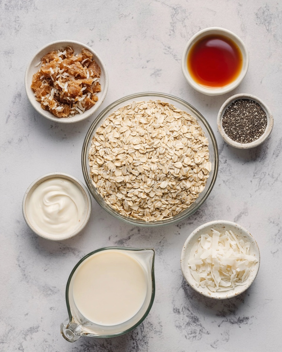 A clear glass bowl filled with light beige rolled oats sits in the center on a white marbled surface. Surrounding it are five small white bowls: one contains brown toasted coconut pieces, another has creamy white yogurt with a smooth top, a third holds a deep amber liquid, likely syrup, a fourth contains small black chia seeds, and a fifth has shredded white coconut flakes with a snowy texture. A glass measuring cup filled with light creamy milk is also on the surface, showing a smooth and shiny texture. Photo taken with an iphone --ar 4:5 --v 7