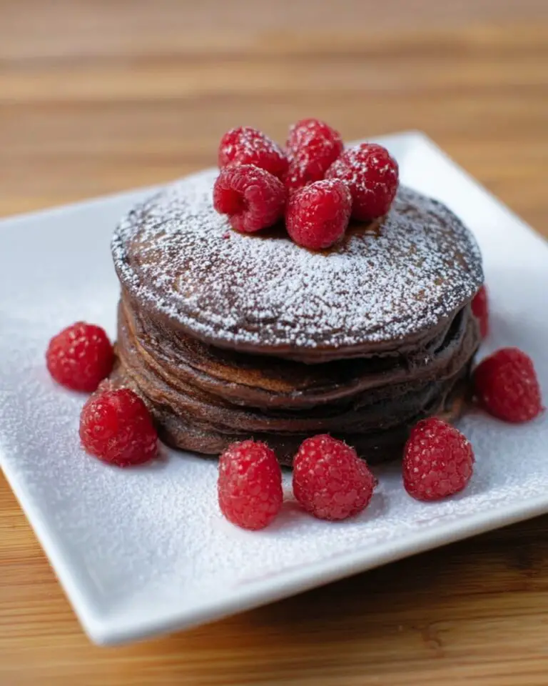 Chocolate Pancakes with Fresh Fruit and Powdered Sugar Recipe