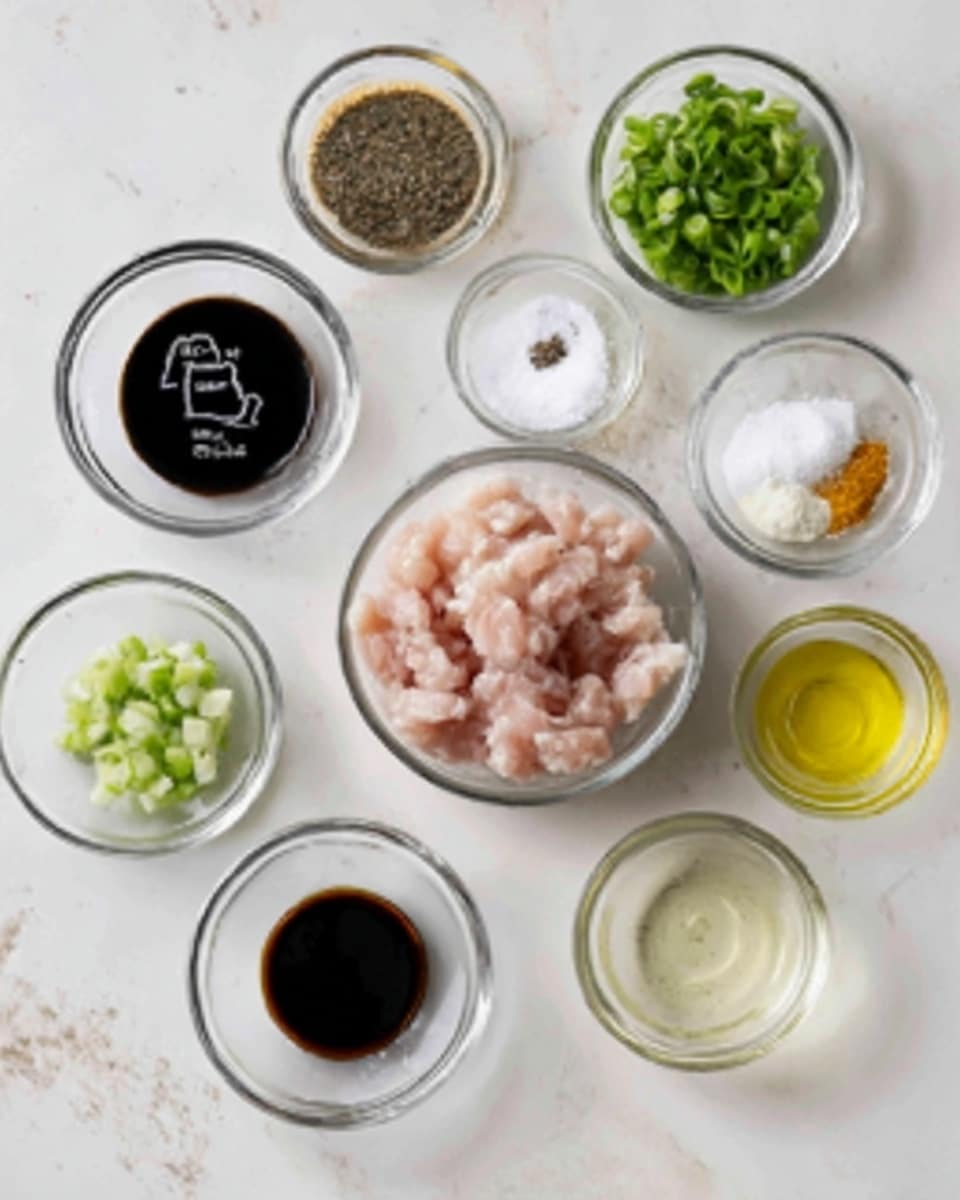 The image shows ten small glass bowls arranged on a white marbled surface. In the center is a bowl filled with small, light pink raw meat pieces. Surrounding it are bowls holding dark brown paste, black soy sauce, chopped green onions, minced garlic, a white powder, a mix of salt and pepper, clear liquid, and golden oil. One empty bowl is also present. Each bowl is clear glass with different ingredients showing distinct colors and textures. photo taken with an iphone --ar 4:5 --v 7
