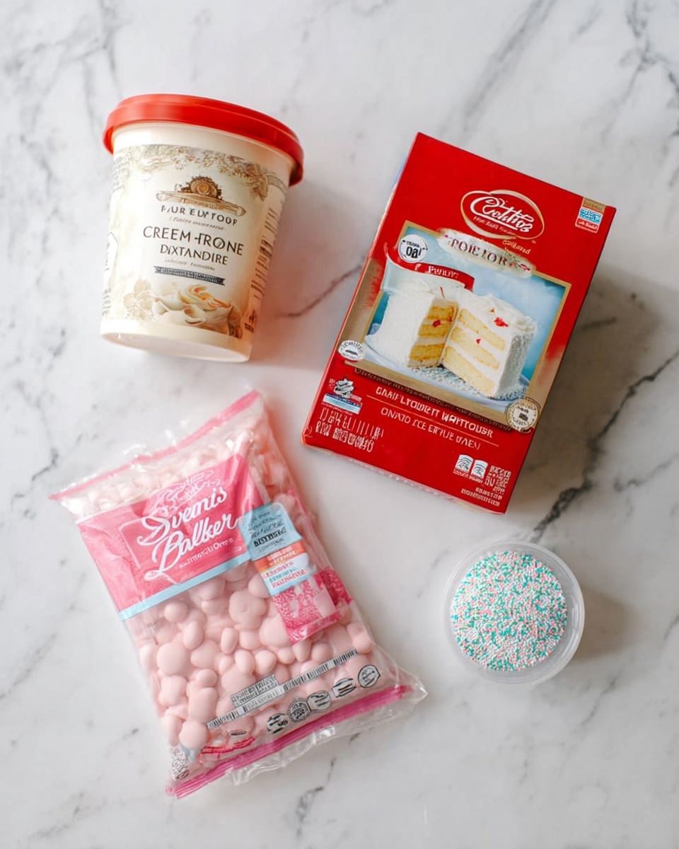 The image shows four baking items on a white marbled surface. At the top left is a tub of Betty Crocker Creamy Deluxe French Vanilla frosting with a red lid and a cream-colored label. To the right of it is a Betty Crocker Super Moist White cake mix box, mainly red with a picture of a white layered cake with frosting on the front. Below the frosting tub is a pink package of Sweet Baker's Meltables, small round candies, with the label showing some text and a clear window revealing the pink melts inside. To the lower right of the package is a small white container of decorative sprinkles with a mix of white and light blue colors visible inside. photo taken with an iphone --ar 4:5 --v 7
