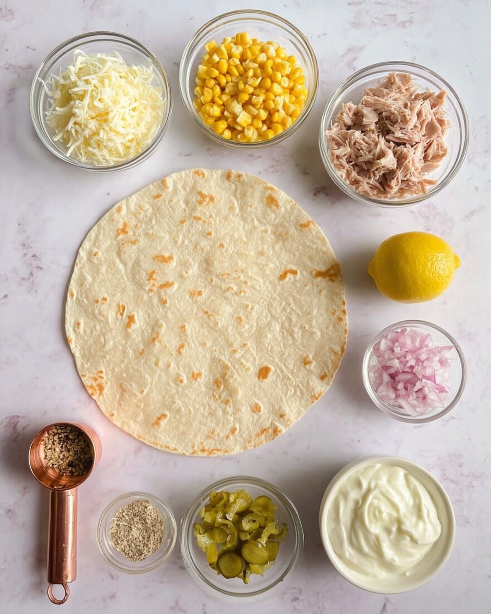 A large round, light yellow tortilla lies flat in the center on a white marbled surface. Around it are seven small clear glass bowls arranged loosely in a semicircle on the top and right side. Starting from the top left, there is a bowl with white shredded cheese, next to it a bowl of bright yellow corn kernels. A halved lemon sits beside the corn. To the right, a bowl holds shredded light brown tuna. Below that, a copper measuring cup contains finely chopped red onions, and next to it a small bowl of light green chopped pickles. Further down, a clear bowl with white sour cream topped with a dollop of pale yellow mustard. Below all these, a small white bowl contains beige seasoning powder with black pepper specks. The scene is clean and simple, photo taken with an iphone --ar 4:5 --v 7