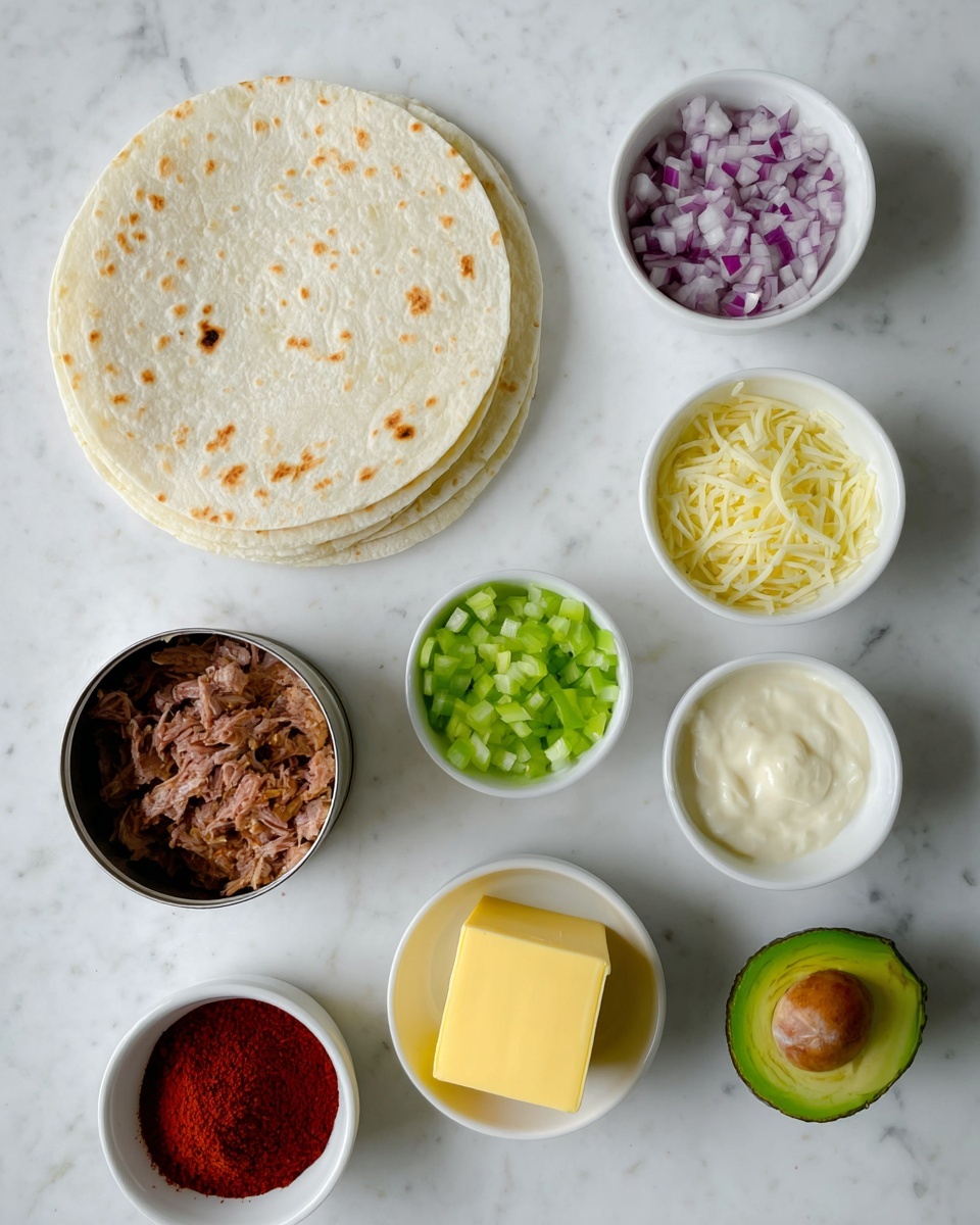 The image shows ingredients for making a dish arranged on a white marbled surface. On the left, there is a stack of round white tortillas with light brown spots. Surrounding this, there are small white bowls; one holds finely chopped red onions, another has small green celery pieces, a third contains grated pale yellow cheese, and a fourth has a creamy white sauce. Below these, there is an open can with shredded brown meat and an avocado with dark green skin next to it. At the bottom of the image, two small white bowls hold a bright red powder and a square piece of yellow butter. photo taken with an iphone --ar 4:5 --v 7
