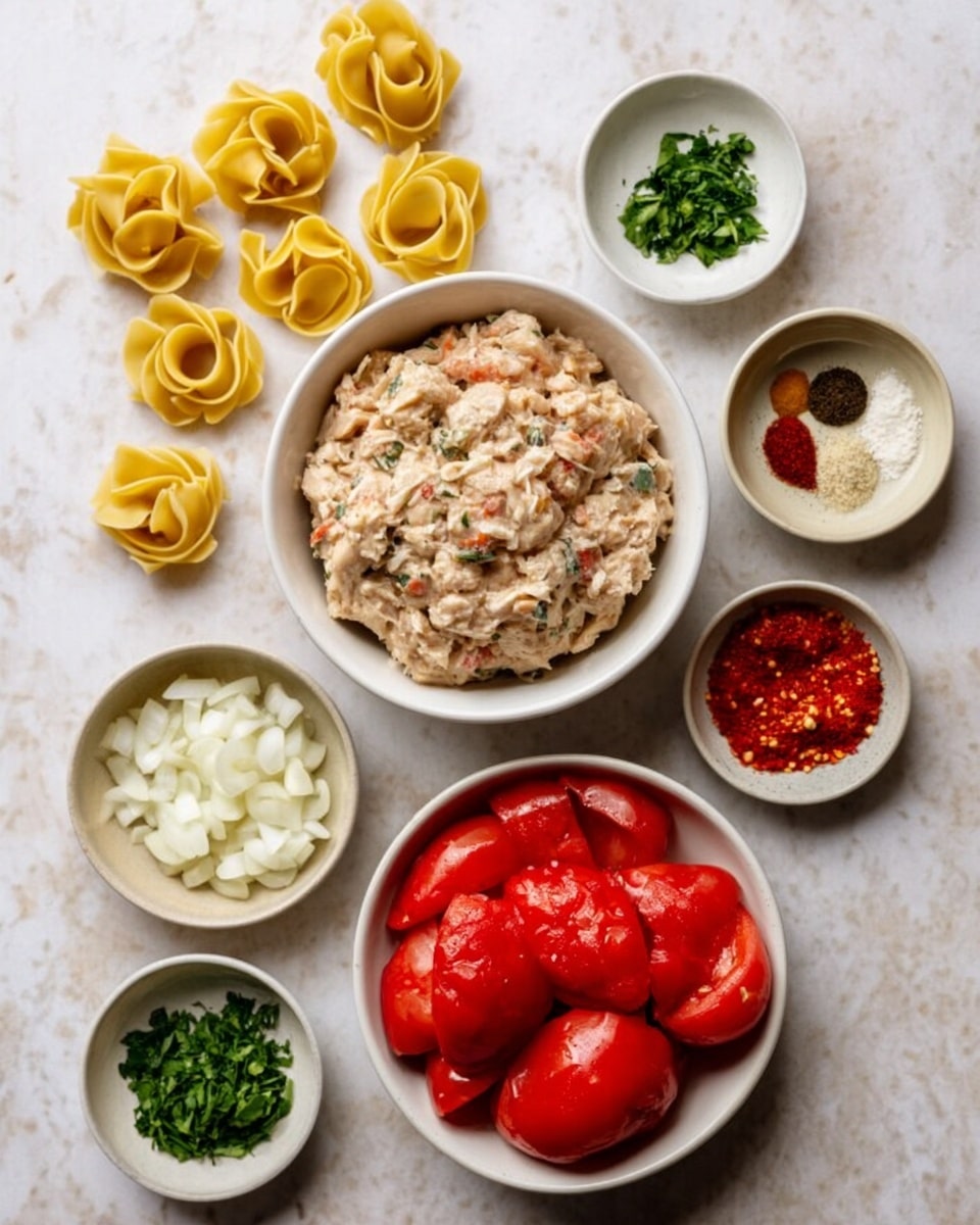 The image shows a white bowl filled with chunky, light beige chicken mixture with visible bits of herbs and small pieces spread evenly in the bowl. Below and to the left of it are several light yellow, curly pasta nests arranged neatly on a white marbled surface. To the right is a white bowl filled with bright red peeled tomatoes, with their smooth, shiny texture visible. Surrounding these main bowls are smaller white bowls containing finely chopped white onions, fresh green herbs, peeled garlic cloves, red chili flakes, coarse salt, dried black pepper, red tomato paste, and whole nutmeg. The white marbled surface adds a clean and bright background to these colorful ingredients. Photo taken with an iphone --ar 4:5 --v 7