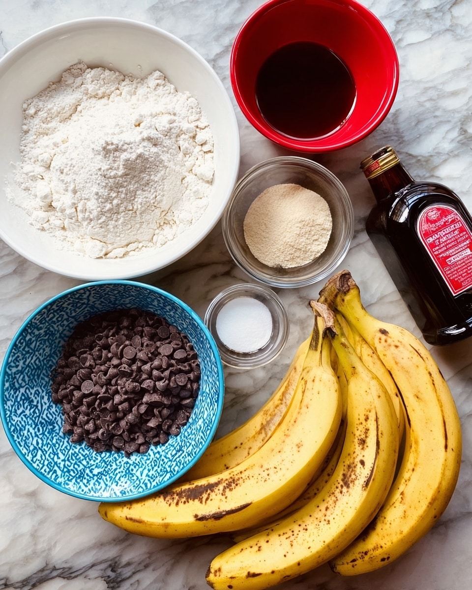 The image shows several baking ingredients arranged on a white marbled surface. In the top left, there is a white bowl filled with white flour. Next to it is a red bowl with a dark brown liquid inside. Below, a small clear glass bowl holds light beige powder, and beside it is another small clear glass bowl with white powder. In the center, a blue patterned bowl is full of small dark brown chocolate chips. At the bottom, there are three ripe yellow bananas with brown spots resting on the surface. A dark glass bottle with a red and white label sits in the top right corner. photo taken with an iphone --ar 4:5 --v 7
