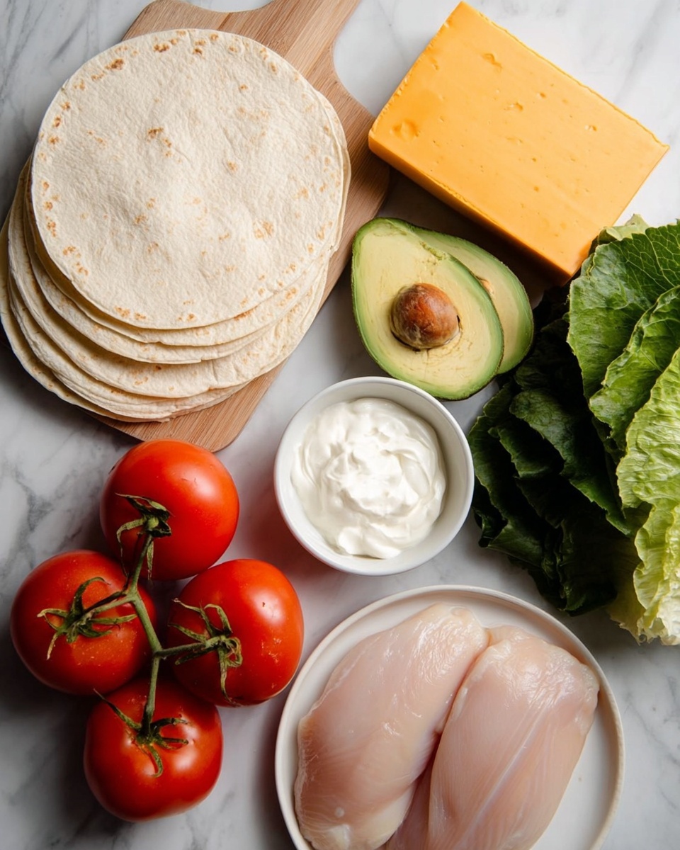 The image shows several fresh ingredients arranged neatly on a white marbled surface. On the left side, there are five round, light beige tortillas stacked in a pile on a wooden board. To the right of the tortillas, two raw, smooth, pale pink chicken pieces rest in a white bowl. Above the chicken, two avocado halves with green flesh and a brown seed in one half are placed, showing a creamy texture. To the left of the avocados, a bunch of three bright red tomatoes with green stems is positioned close together. Above the tomatoes, a large block of sharp orange cheddar cheese sits on a white plate. Next to the cheese, a small white bowl filled with thick white sour cream is visible. Finally, on the upper right side, dark green leafy lettuce leaves add a fresh, leafy texture to the image. photo taken with an iphone --ar 4:5 --v 7
