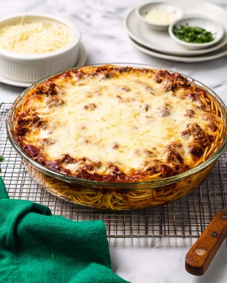 Spaghetti Pie with Sausage, Vegetables, and Melted Mozzarella Recipe