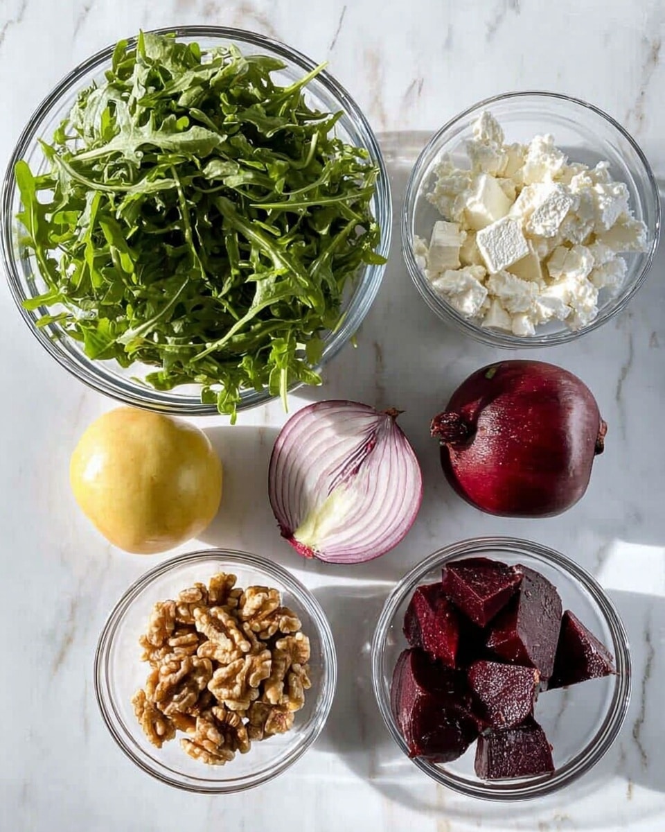 The image shows six main ingredients placed on a white marbled surface: a large clear glass bowl filled with fresh green leafy arugula on the top left; a small clear glass bowl with white crumbled cheese on the top right; a half of a red onion sliced horizontally in the middle; a small clear glass bowl filled with dark red cooked beets on the bottom right; a small clear glass bowl with light brown walnut pieces in the bottom middle; and a quarter piece of a yellow apple at the bottom left. The ingredients are all separate and neatly arranged, with bright natural light shining on them photo taken with an iphone --ar 4:5 --v 7