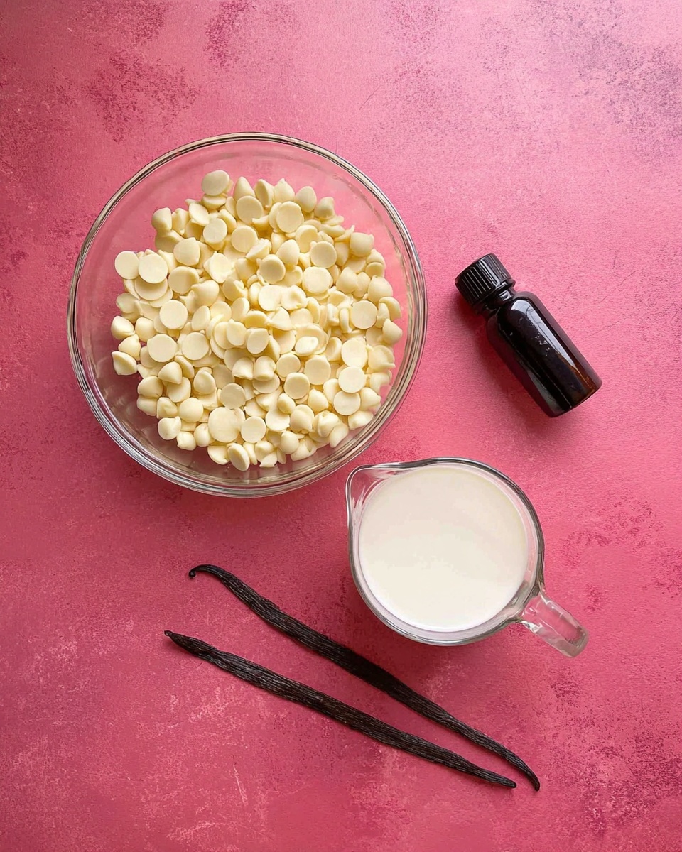 A clear glass bowl filled with small, round, pale yellow chocolate chips is placed on a bright pink textured surface. Below it, slightly to the left, is a clear glass measuring cup containing thick white cream. To the right of the measuring cup are two long, thin, dark brown vanilla beans lying side by side, and next to them, a small black bottle with a black cap sits resting on the surface. photo taken with an iphone --ar 4:5 --v 7