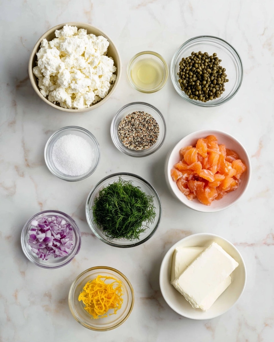The image shows nine small bowls arranged on a white marbled surface. The largest bowl on the top left is filled with a soft, crumbly white cheese. To the right is a small glass bowl holding dark green capers, and next to it is another glass bowl with a mixed black and white seed seasoning. Below the capers is a glass bowl with coarse white salt. Under the cheese bowl is a glass bowl with small, chopped purple onions. In the center is a glass bowl filled with fresh green chopped herbs, likely dill. On the top right is a white bowl containing small chunks of bright orange smoked salmon. Below the onions is a small glass bowl with thin strips of yellow lemon zest. Next to it is a white bowl holding two thick slices of creamy white cream cheese. Finally, at the bottom right is a glass bowl with light yellow lemon juice. Photo taken with an iphone --ar 4:5 --v 7