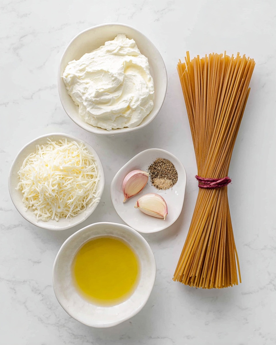 The image shows five white dishes on a white marbled surface. On the right, there is a bundle of uncooked brown spaghetti tied with a thin dark red ribbon, standing upright. To its left, in a round white bowl, there is a thick white creamy cheese with whipped texture. Above that, a small white bowl contains two peeled garlic cloves alongside a small pile of salt and ground black pepper, each in separate portions. To the left of the creamy cheese is another white bowl filled with shredded white cheese. Below this, a shallow white bowl contains a smooth layer of golden olive oil, reflecting light. The overall layout is neat and simple, emphasizing the textures and colors of the ingredients. photo taken with an iphone --ar 4:5 --v 7