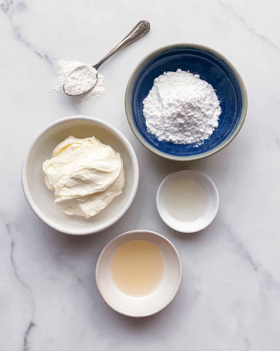 The image shows four small bowls and a spoon arranged on a white marbled surface. The top right bowl is white with a deep blue inside and filled with white powder that looks like flour or sugar. Below it, another bowl with the same colors holds a thick, creamy white substance with a soft texture. To the right of this, there is a small white bowl with a clear liquid inside. Below this bowl, a white shallow dish contains a pale brown liquid. A simple silver spoon with some powder on it lies on the marble surface above the bowls. photo taken with an iphone --ar 4:5 --v 7