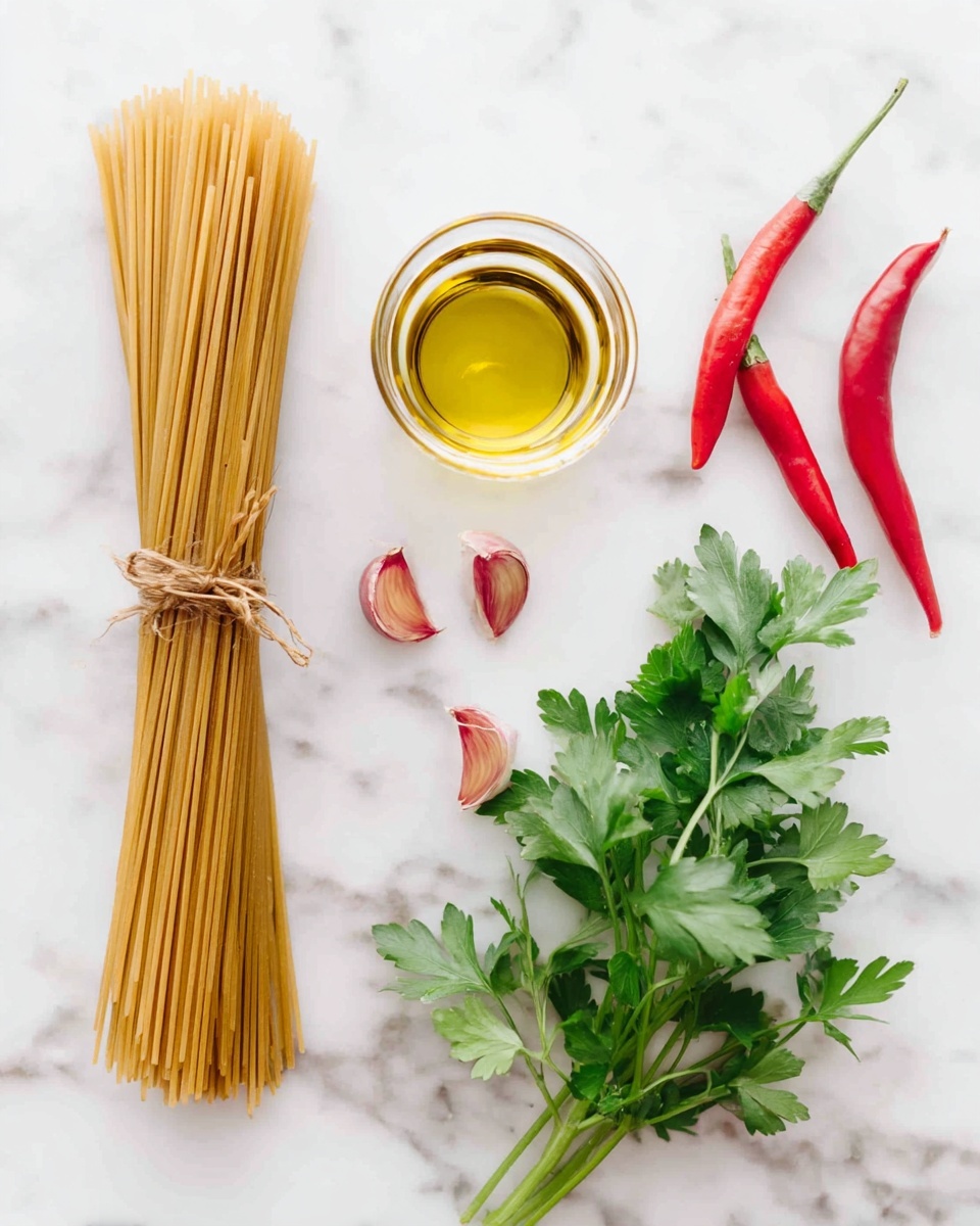The image shows cooking ingredients arranged neatly on a white marbled surface. On the left side, there is a bundle of whole wheat spaghetti tied with a brown string. In the middle, there is a clear glass container with golden olive oil inside, viewed from above showcasing its round shape and smooth texture. Below the container, five small cloves of garlic with a reddish tint are scattered. On the right side, there are three red chili peppers with green stems, and above them, a bunch of fresh green parsley leaves with detailed texture. photo taken with an iphone --ar 4:5 --v 7