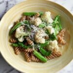 Garden Vegetable Pasta Bowl with Cauliflower, Snap Peas, and Garlic Scapes Recipe