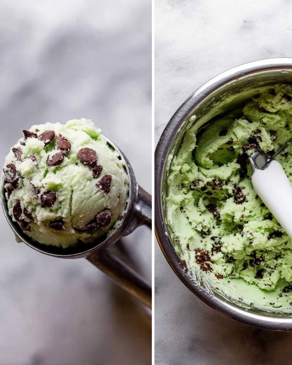 The image shows two views of a cookie dough making process. On the right, there is a silver bowl filled with pale green dough mixed with dark chocolate chunks and cocoa powder, with a white spatula stirring the mixture. On the left, a silver ice cream scoop holds a round, full ball of the same pale green dough with dark chocolate pieces, lifted above the bowl. The background is a white marbled texture. The dough looks soft and slightly textured. Photo taken with an iphone --ar 4:5 --v 7