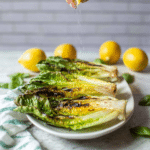 Grilled Romaine Salad with Cherry Tomatoes, Olives, and Fresh Basil Recipe