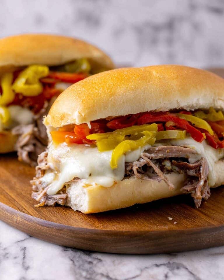 Italian Beef Sandwiches with Melty Cheese, Peppers, and Pepperoncini Recipe