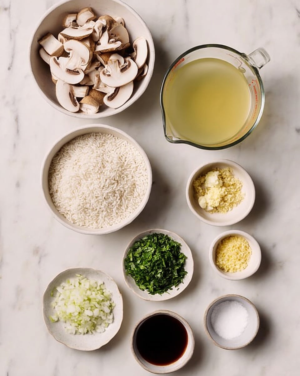 A white marbled surface holds several small white bowls and a clear measuring cup arranged neatly. The top bowl contains light brown sliced mushrooms. Next to it, a clear measuring cup is filled with pale yellow liquid broth. Below, there is a white bowl with white arborio rice grains. Surrounding these are smaller white bowls with finely chopped white onion, bright green chopped herbs, pale yellow minced garlic, salt, yellow powder (nutritional yeast), small white scoops of a creamy substance, and a small bowl of dark brown liquid sauce. The arrangement is simple and clean, with each ingredient clearly visible. photo taken with an iphone --ar 4:5 --v 7