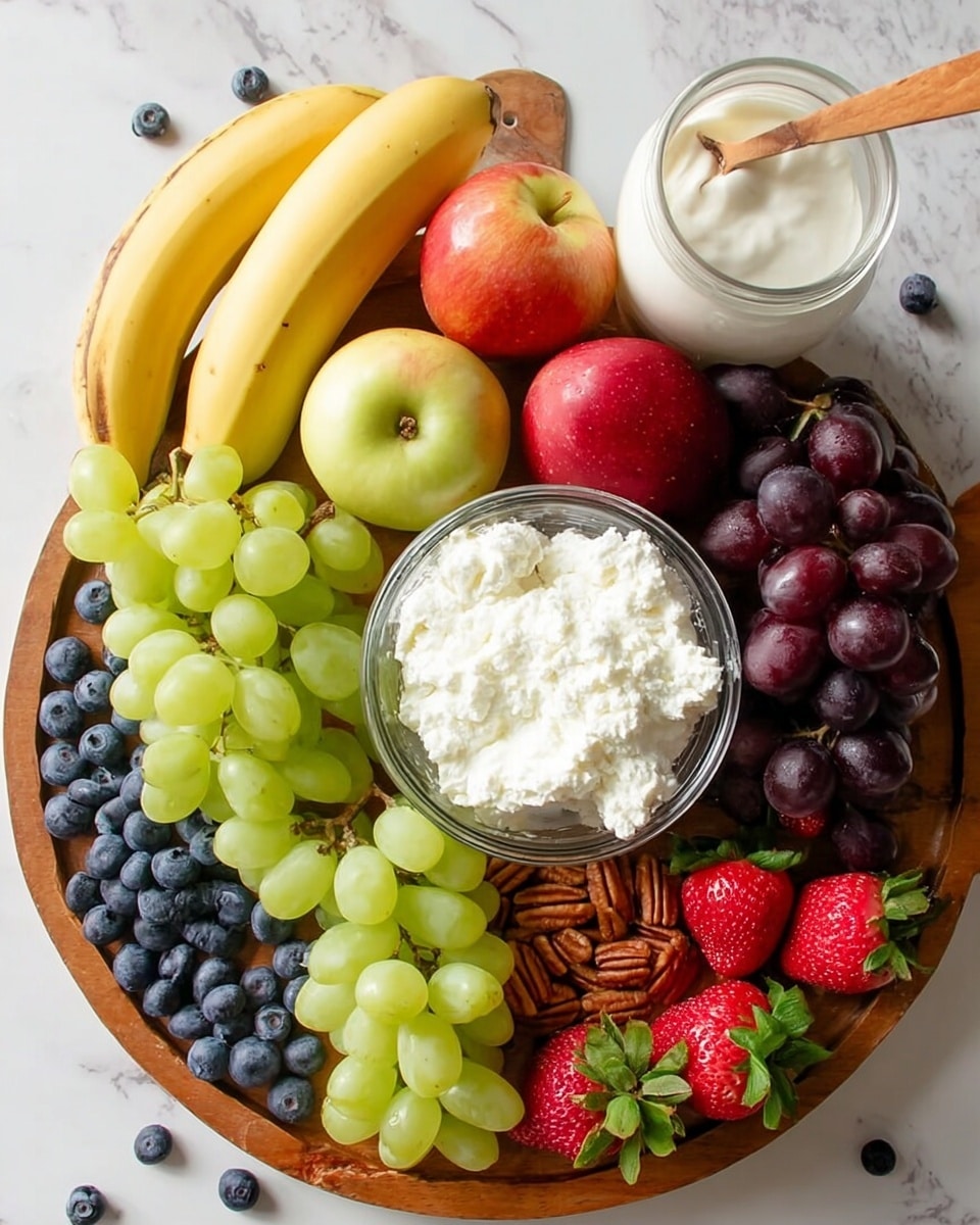 A wooden round board holds a colorful fruit and nut arrangement on a white marbled surface. On the top left, three yellow bananas rest next to two red and green apples. Below the apples, there are clusters of green grapes on the left and dark red grapes on the right, with pecans placed between the two grape groups. To the far right, bright red strawberries with green leaves are grouped together. At the bottom center of the board, there is a clear glass bowl filled with white cottage cheese. A white jar with a lid and a wooden spoon is placed at the top right corner of the board. Scattered blueberries appear around the board on the white marbled surface. photo taken with an iphone --ar 4:5 --v 7