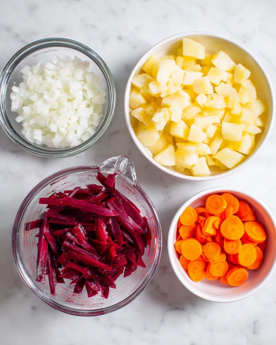Four bowls are arranged on a white marbled surface. The largest bowl is white and filled with light yellow potato cubes soaking in water, placed at the top right. To its left is a medium-sized clear glass bowl with small white finely chopped onions. Below is a clear measuring cup holding long deep red beet strips. To the right of this cup is a small white bowl filled with orange carrot slices. All bowls show fresh, raw vegetables with bright and natural colors. Photo taken with an iphone --ar 4:5 --v 7