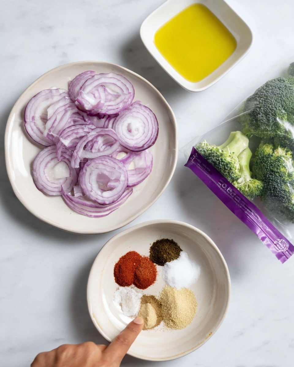 The image shows a white round plate filled with thin slices of purple onion placed near the center. Above it, a white square dish holds a small amount of yellow oil. To the right, a purple bag of frozen broccoli rests on a white marbled surface. Below, a small white round bowl contains five different spices arranged in separate piles: a dark brown powder, white granules, a bright red powder, light brown granules, and pale yellow powder. A woman's finger lightly touches the brown spices in the bowl. Photo taken with an iphone --ar 4:5 --v 7