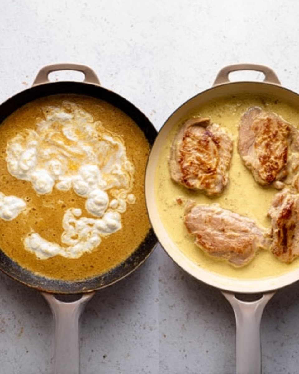 Two white pans sit side by side on a white marbled surface. The left pan contains a thick golden sauce with some white creamy dollops on top, showing a mix of smooth and slightly lumpy textures. The right pan holds four pieces of light brown cooked meat, partially covered in a creamy pale yellow sauce. The sauce looks smooth and gently surrounds the meat pieces evenly. The pans are seen from above, showing the layers of sauce and meat clearly. photo taken with an iphone --ar 4:5 --v 7
