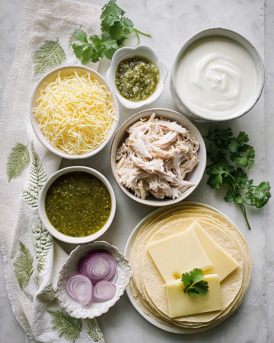 The image shows a top view of a white marbled surface with a white cloth that has green fern leaves embroidered on it. On the cloth, there are multiple small white bowls and a larger round white plate. One bowl contains shredded light yellow cheese, another bowl has smooth white sour cream, a third bowl is filled with shredded white cooked chicken, and the fourth bowl holds green salsa topped with a single green cilantro leaf. Two small white scalloped dishes contain thin rings of purple onion. On the large white plate, there are layers of light yellow tortillas with several pale yellow slices of cheese on top. Fresh green cilantro sprigs are also seen near the bowls. The arrangement is neat and colors are soft and natural, creating a fresh, inviting look. Photo taken with an iphone --ar 4:5 --v 7