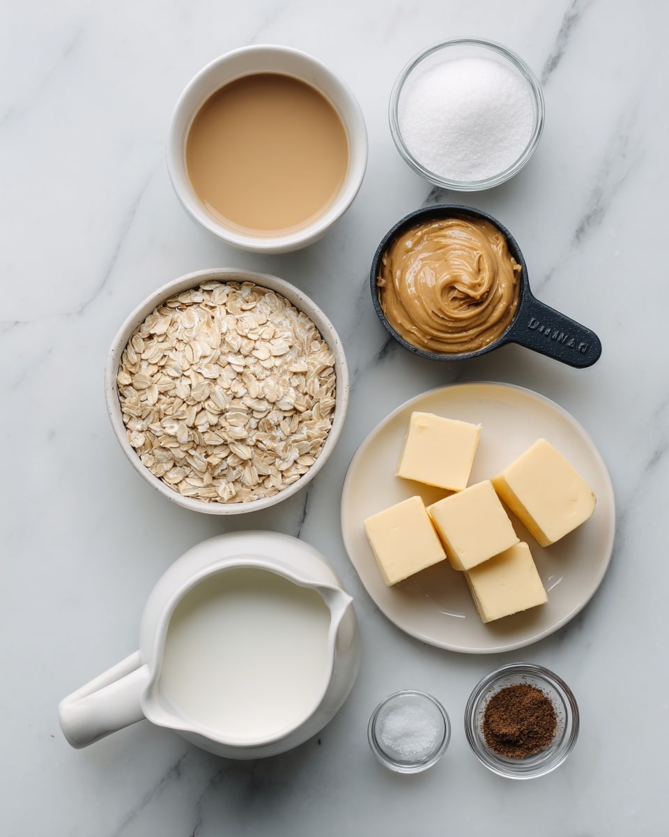 A flat lay of seven small containers with baking ingredients arranged on a white marbled surface. Starting from the top left, there is a small white bowl with a light brown liquid, next to it is a black measuring cup filled with smooth, light brown peanut butter. To the right is a white bowl filled with fine white sugar. Below the sugar, on the right, is a small white plate holding pale yellow cubes of butter. Centered below the peanut butter is a clear measuring cup with white milk. On the bottom left, there's a white pitcher-shaped bowl filled with dry oats, and to its left, a small clear cup containing a dark brown powder. All items are neatly placed with space between each container, showing the natural textures and colors clearly. Photo taken with an iphone --ar 4:5 --v 7