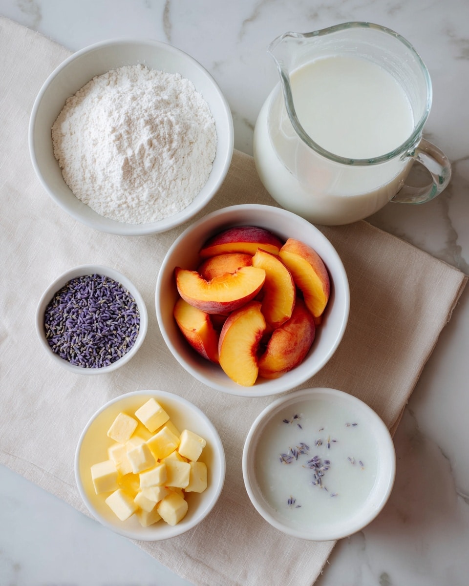 The image shows six white bowls and a clear measuring jug on a white marbled surface. The largest white bowl holds white flour with a powdery texture. Below it, a medium white bowl is filled with sliced cooked peaches that are shiny and soft, showing shades of orange and red. To the right, a smaller white bowl contains a white liquid with small lavender pieces floating on top. Below that bowl, another small white bowl is filled with yellow cubed butter. To the left, a very small white bowl holds dried lavender buds that are small and purple-gray in color. A clear glass measuring jug with white milk is also partially visible on the right side. The bowls and jug are placed on a soft beige cloth. photo taken with an iphone --ar 4:5 --v 7